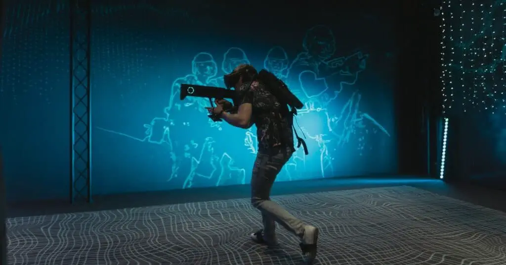 Create Your Ultimate Gaming Setup in 2024 8 A visual image of a guy wearing virtual reality equipment for immersive gaming experiance.